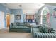 Bedroom with vaulted ceilings, large window and sitting area at 545 Ashvale Overlook, Alpharetta, GA 30005