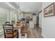 Eat-in kitchen with stainless appliances, ample storage, and a large window with natural light at 545 Ashvale Overlook, Alpharetta, GA 30005
