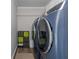 Convenient laundry room with modern washer and dryer units at 545 Ashvale Overlook, Alpharetta, GA 30005