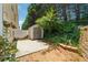 Private backyard with a storage shed at 3665 Magnolia Walk Trl, Cumming, GA 30040