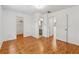 Spacious bedroom offers wood floors, closet, and bathroom access at 3665 Magnolia Walk Trl, Cumming, GA 30040