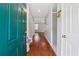 Bright entryway featuring hard wood floors leading to the rest of the home at 3665 Magnolia Walk Trl, Cumming, GA 30040