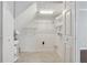 Storage room with white painted walls and wire shelving for storage and easy organization at 3665 Magnolia Walk Trl, Cumming, GA 30040