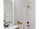Cozy bathroom featuring a shower and bathtub combo with a single sink vanity at 1496 Clarecastle Ln, Buford, GA 30519