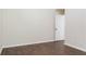 Bedroom showcasing hardwood floors, neutral walls, and white trim at 1496 Clarecastle Ln, Buford, GA 30519