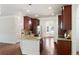 Gourmet kitchen featuring granite countertops, stainless steel appliances, and custom cabinetry at 1496 Clarecastle Ln, Buford, GA 30519