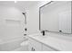 Modern bathroom featuring a shower and a marble vanity at 3205 Bold Springs Rd, Dacula, GA 30019
