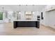 Gourmet kitchen featuring a large island, custom cabinets, marble countertops, and modern appliances at 3205 Bold Springs Rd, Dacula, GA 30019