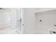 Laundry room features tile floors, utility sink, and easy access to the bathroom at 3205 Bold Springs Rd, Dacula, GA 30019