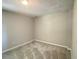 Neutral bedroom featuring carpet, base trim and natural light at 4044 Robin Cir, Atlanta, GA 30349
