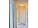 Hallway with neutral walls and trim featuring access to several rooms at 4044 Robin Cir, Atlanta, GA 30349