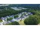 An impressive aerial shot captures the community, nestled among lush greenery, offering a tranquil and secluded living environment at 646 Lakes Cir, Lithonia, GA 30058
