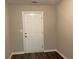 Entryway with a neutral paint palette and wood-look flooring at 646 Lakes Cir, Lithonia, GA 30058