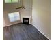 High-angle shot showcasing the living room, with a fireplace and ample natural light at 646 Lakes Cir, Lithonia, GA 30058