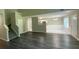 View of the living room with open layout and staircase leading to the upper level at 646 Lakes Cir, Lithonia, GA 30058