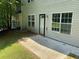 A cozy patio area outside a house, ideal for relaxing or entertaining guests outdoors at 646 Lakes Cir, Lithonia, GA 30058