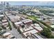 Wide aerial view of the neighborhood showing rooftops, trees, train tracks, highways, and the city skyline in the distance at 322 Peters Sw St # 2, Atlanta, GA 30313