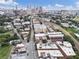 A sprawling aerial shot captures red brick rooftops, trees, the city skyline and surrounding highway systems on a bright day at 322 Peters Sw St # 2, Atlanta, GA 30313