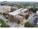 Aerial view of a neighborhood featuring diverse buildings, streetscapes, and well-maintained roadways at 322 Peters Sw St # 2, Atlanta, GA 30313