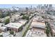 Aerial view of the neighborhood with downtown skyline, sports stadium, and commercial buildings at 322 Peters Sw St # 2, Atlanta, GA 30313