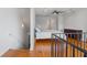 This loft bedroom shows hardwood floors, neutral walls, ceiling fan and natural light at 322 Peters Sw St # 2, Atlanta, GA 30313