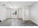 Bonus room features natural light, a sleek concrete floor and neutral paint at 322 Peters Sw St # 2, Atlanta, GA 30313