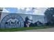 A beautiful mural in Castleberry Hill features a portrait of Herman J. Russell and the city skyline at 322 Peters Sw St # 2, Atlanta, GA 30313