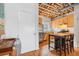 Kitchen featuring stainless steel appliances and cabinets, hardwood floors, and exposed ceiling at 322 Peters Sw St # 2, Atlanta, GA 30313