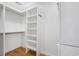 Bright walk-in closet features built-in shelving and wooden floors providing efficient storage at 322 Peters Sw St # 2, Atlanta, GA 30313