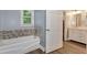 Bathroom featuring a bathtub, tiled wall, and a single sink vanity at 4882 Rabbit Farm Road Rd, Loganville, GA 30052