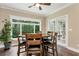 Breakfast nook with large window offering scenic views and light fixtures at 4882 Rabbit Farm Road Rd, Loganville, GA 30052
