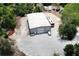 Metal building with an RV and trailer parking on a gravel lot creates a functional outdoor space at 4882 Rabbit Farm Road Rd, Loganville, GA 30052