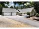 Spacious home featuring a long driveway and a three-car garage at 4882 Rabbit Farm Road Rd, Loganville, GA 30052
