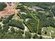 Aerial view showcasing 9.71 acres of land with mature trees and approximate lot lines at 4882 Rabbit Farm Road Rd, Loganville, GA 30052