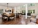 Spacious living room and dining area featuring hardwood floors, tall ceilings and plenty of natural light at 4882 Rabbit Farm Road Rd, Loganville, GA 30052