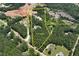 A 9.71-acre lot, bordered in yellow, featuring mature trees and a private setting at 4882 Rabbit Farm Road Rd, Loganville, GA 30052