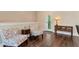 Interior sitting area with hardwood floors and decorative chairs at 4882 Rabbit Farm Road Rd, Loganville, GA 30052