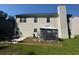 Two-story house backyard with patio and fenced lawn at 6432 Polar Fox Ct, Riverdale, GA 30296