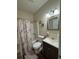 Bright bathroom features a shower and tub combination at 6432 Polar Fox Ct, Riverdale, GA 30296