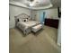 Comfortable bedroom featuring neutral carpet, updated dresser, and plenty of natural light at 6432 Polar Fox Ct, Riverdale, GA 30296