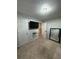 Bedroom with carpet floors, neutral walls, ceiling light and a closet door at 6432 Polar Fox Ct, Riverdale, GA 30296