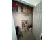 Walk-in closet with boxes and household items at 6432 Polar Fox Ct, Riverdale, GA 30296