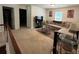 Inviting living room featuring neutral walls, carpet, and a comfortable sofa set with a coffee table at 6432 Polar Fox Ct, Riverdale, GA 30296