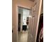 This shows a view from the closet leading to the ensuite bathroom with double sinks at 6432 Polar Fox Ct, Riverdale, GA 30296