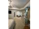 A large main bedroom boasts a ceiling fan, sitting area, and plenty of space at 6432 Polar Fox Ct, Riverdale, GA 30296