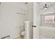 The bathroom features a private toilet room and a ceiling fan at 1384 Dolcetto Nw Trce, Kennesaw, GA 30152
