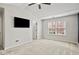 Spacious bedroom with vaulted ceiling and modern ceiling fan at 1384 Dolcetto Nw Trce, Kennesaw, GA 30152