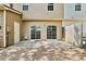 Back patio with sliding glass doors and a fenced in area that could be used for outdoor living at 1384 Dolcetto Nw Trce, Kennesaw, GA 30152