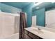 Bathroom featuring tub-shower combination with curtain at 1548 Station Ridge Dr, Lawrenceville, GA 30045