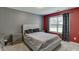 A cozy secondary bedroom with a neutral color scheme and ample natural light at 1548 Station Ridge Dr, Lawrenceville, GA 30045